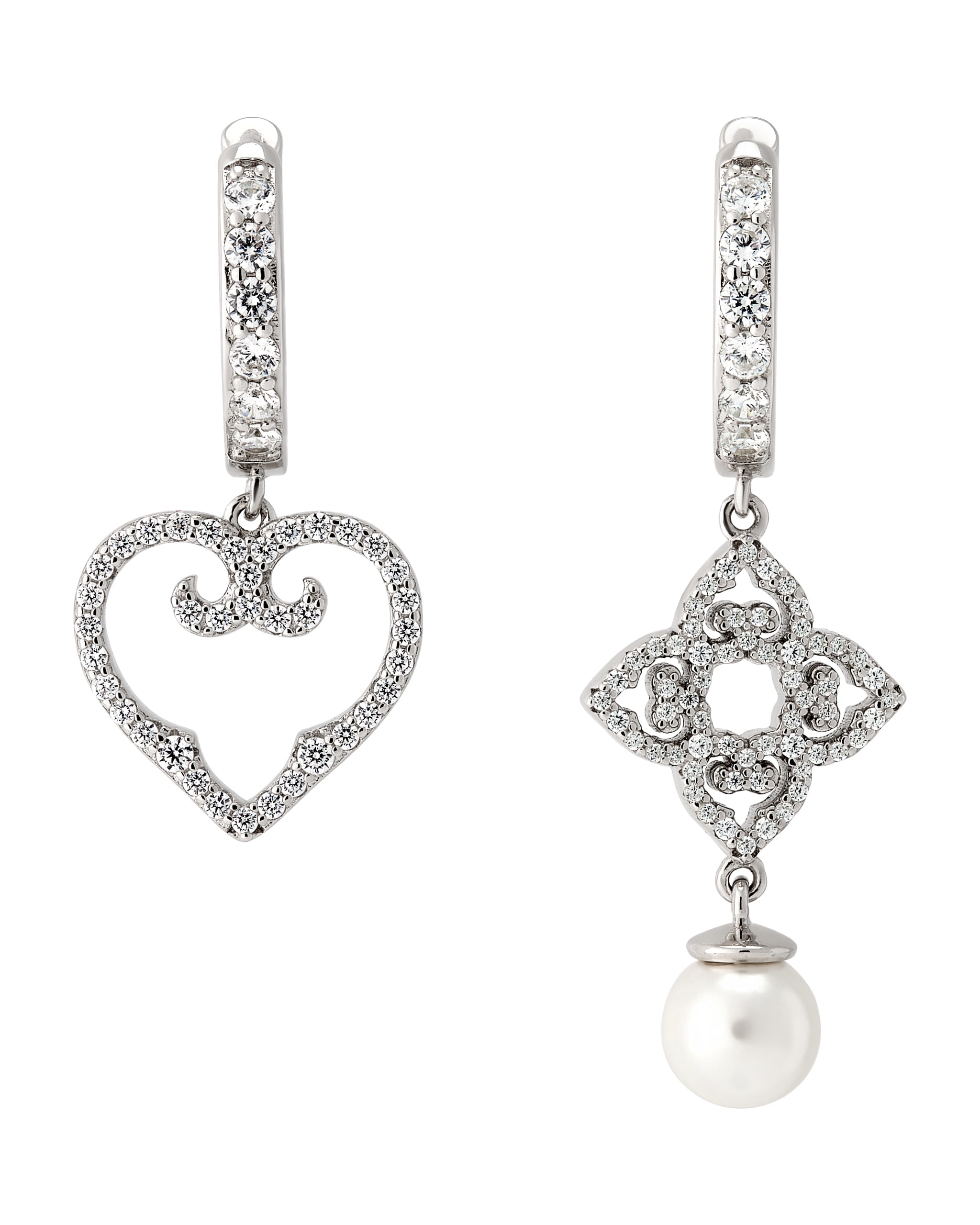 Pair of silver earrings with heart and clover designs on a white background
