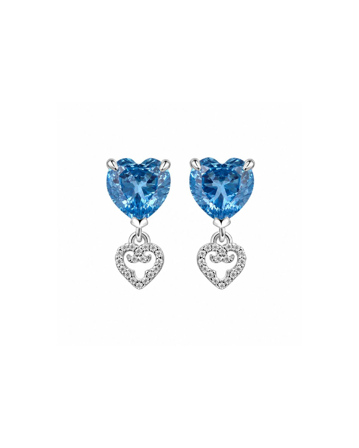 A pair of silver heart stud earrings with dangling heart charms. The top heart-shaped stones are light blue, and the dangling heart charms are outlined with small clear stones.